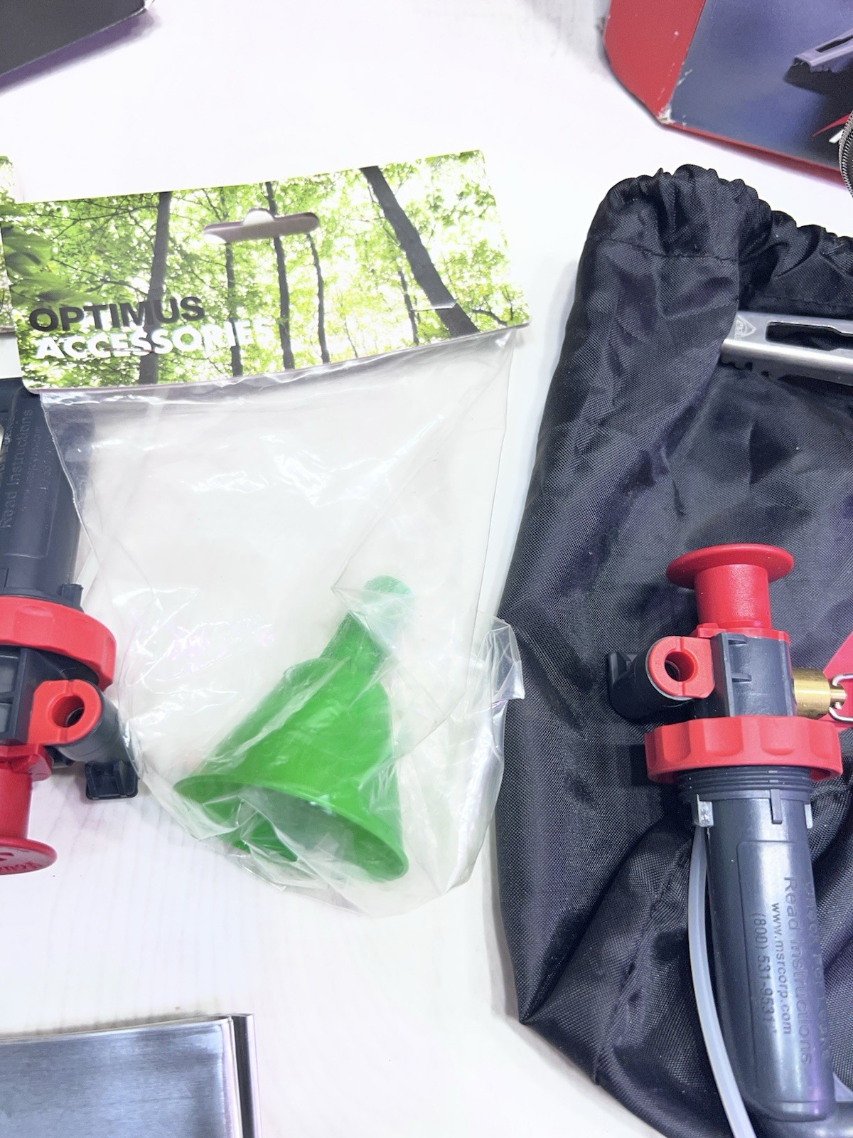 XGK EX MSR MULTI FUEL STOVE TWO STANDARD FUEL PUMPS TWO 30 OZ FUEL BOTTLES CAMP