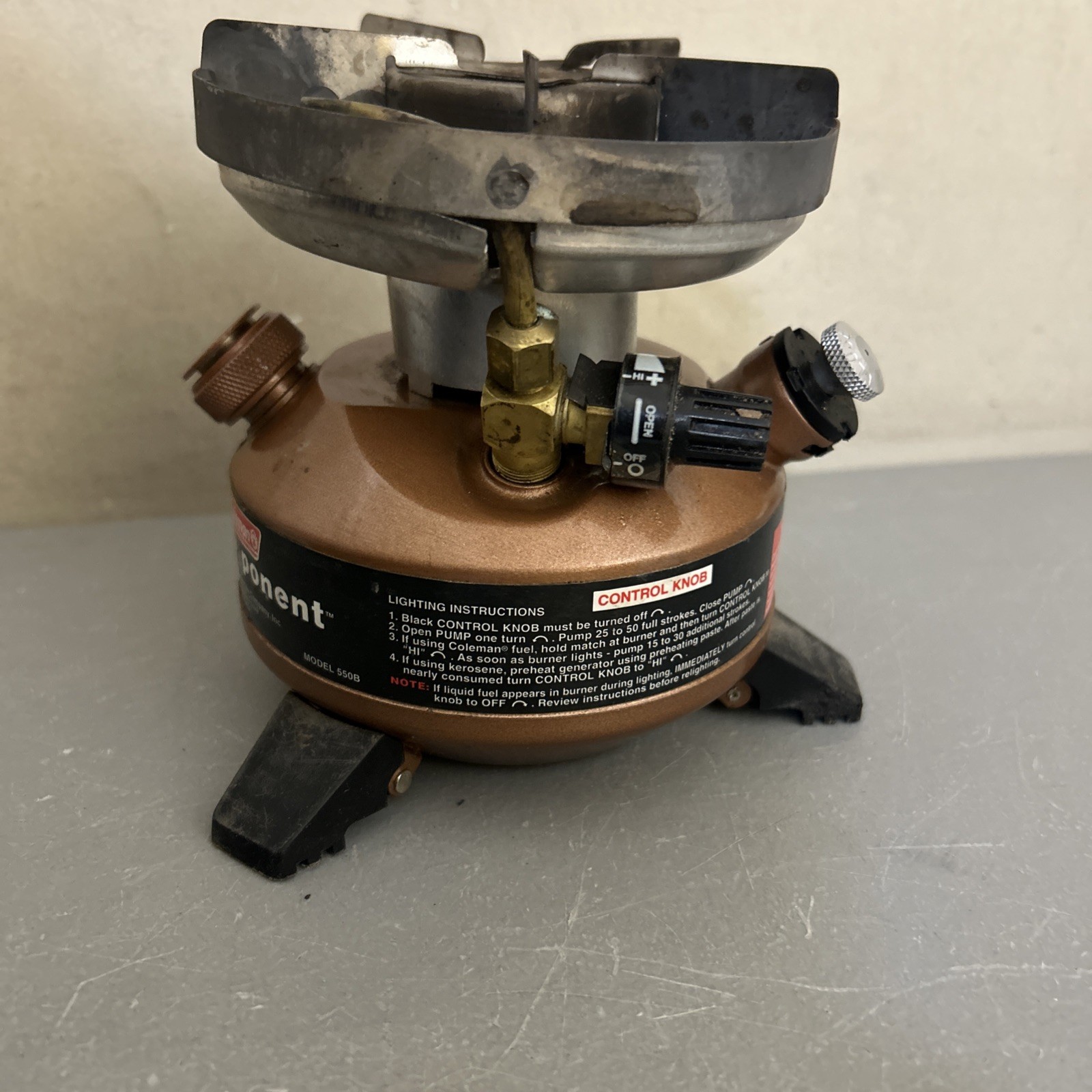 Coleman “Exponent” Multi Fuel Stove Model 550B (dented/ Peeled Paint)
