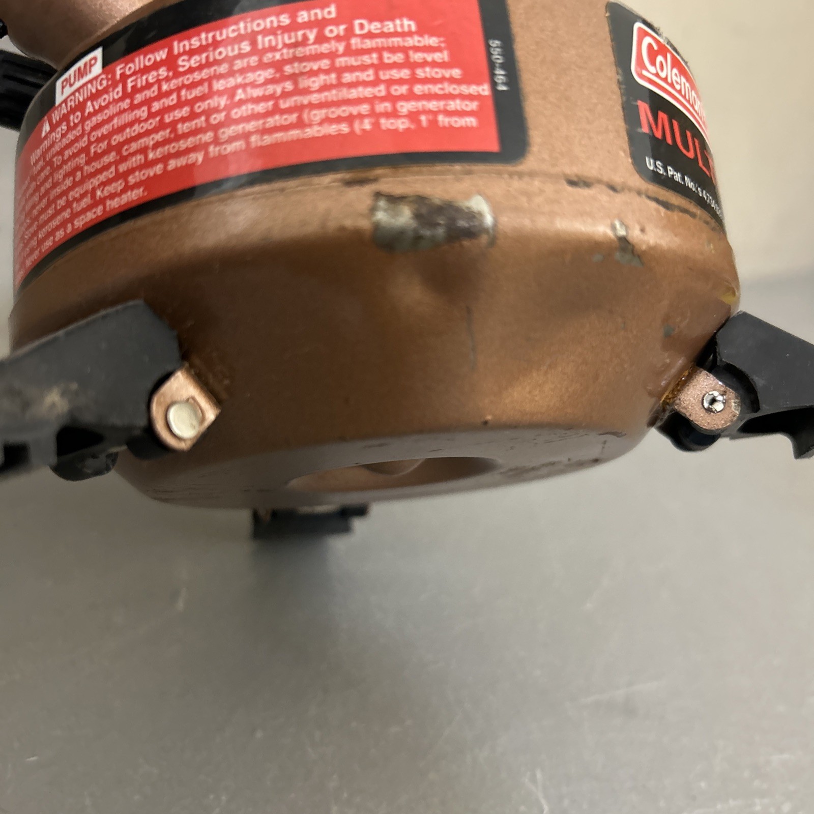 Coleman “Exponent” Multi Fuel Stove Model 550B (dented/ Peeled Paint)