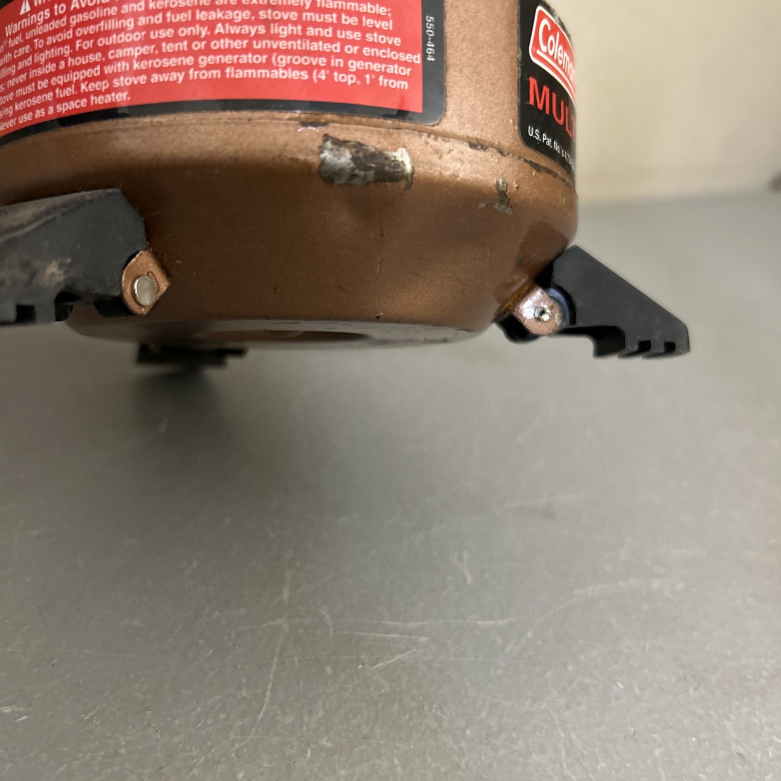 Coleman “Exponent” Multi Fuel Stove Model 550B (dented/ Peeled Paint)