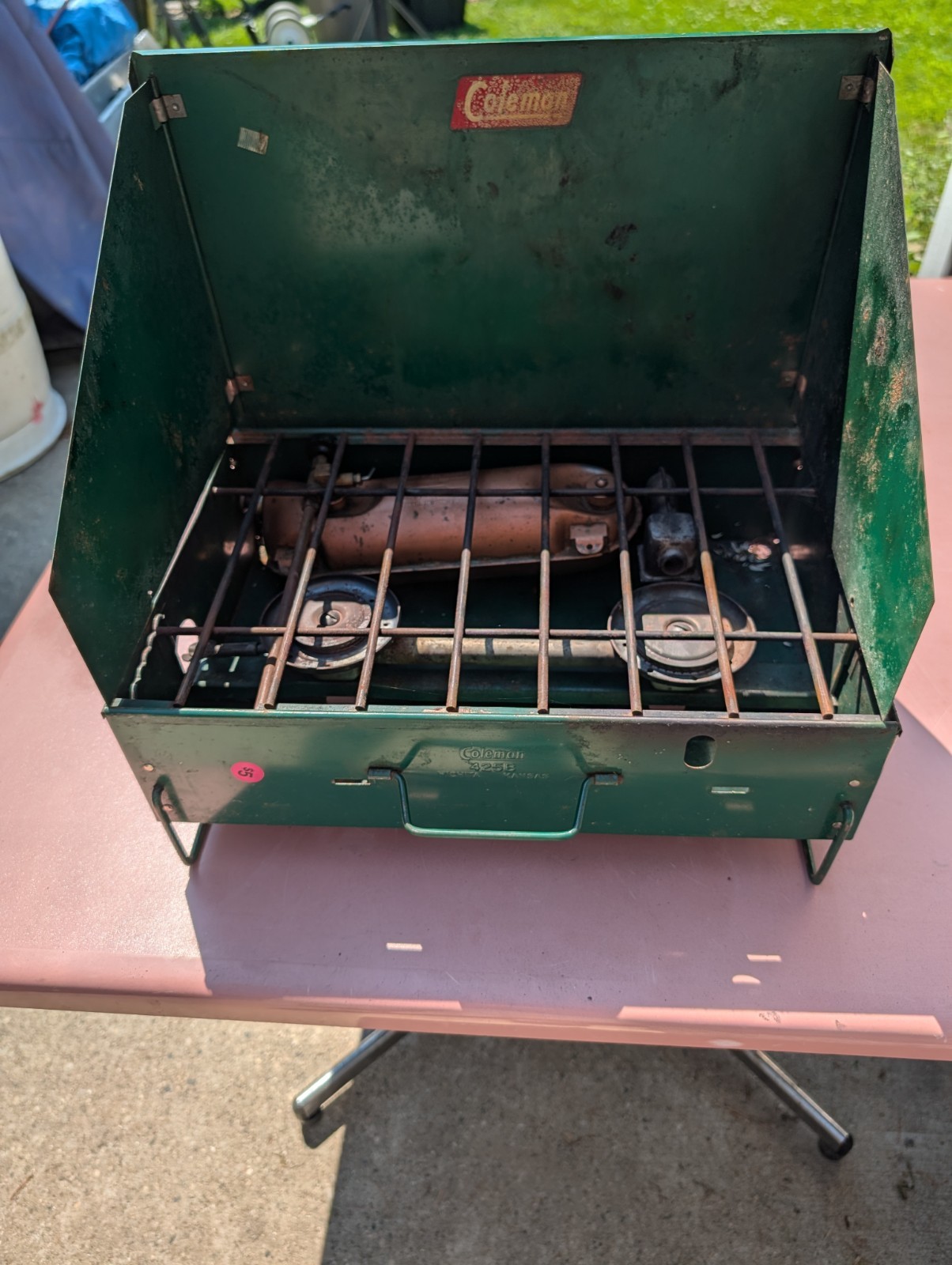 (2) Coleman Camp Stoves (Selling by the Stove) – One with Folding Legs