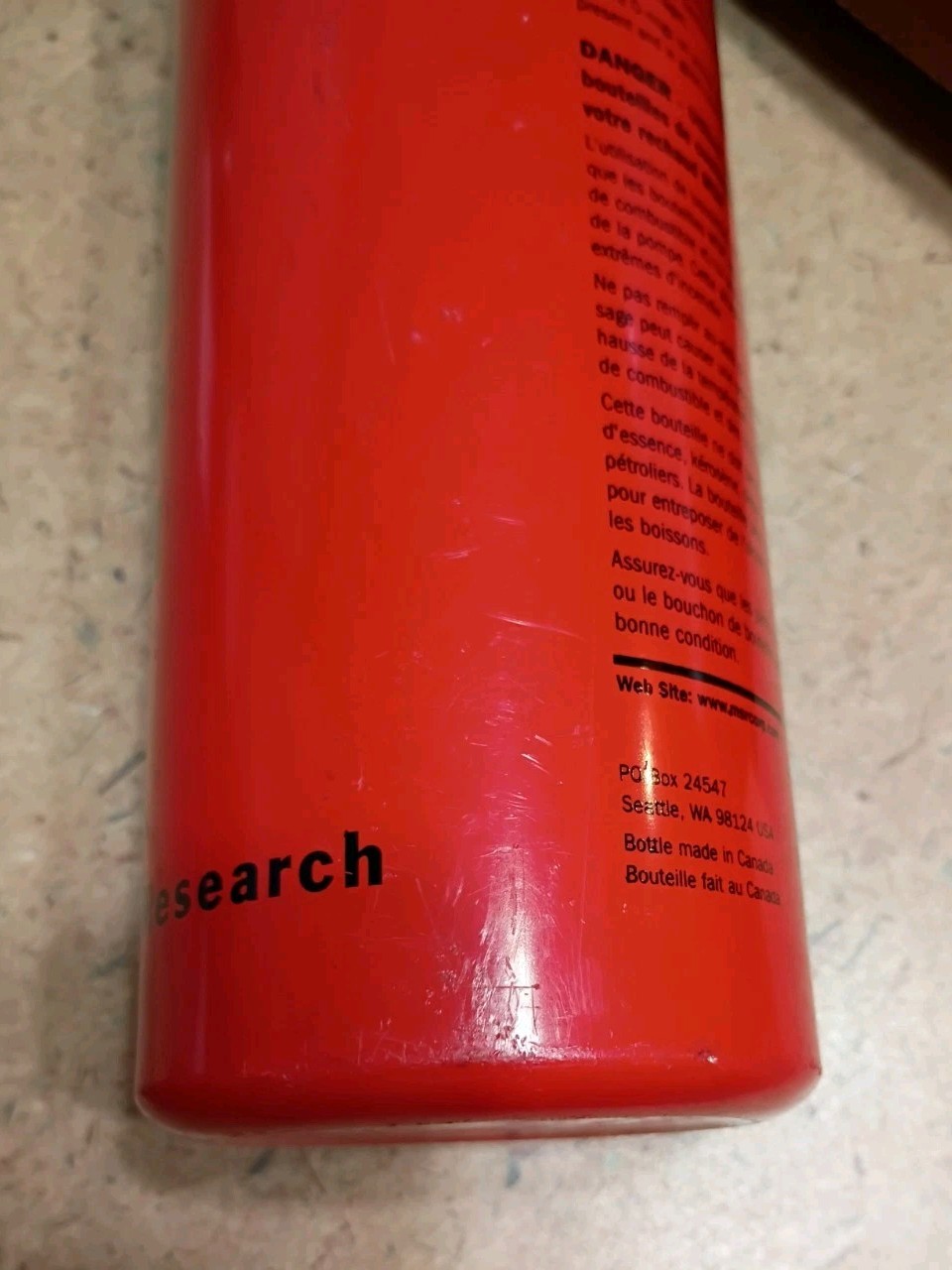 MSR 33oz. Red Aluminum Camping Stove Fuel Bottle w/ Protective Leather Holder