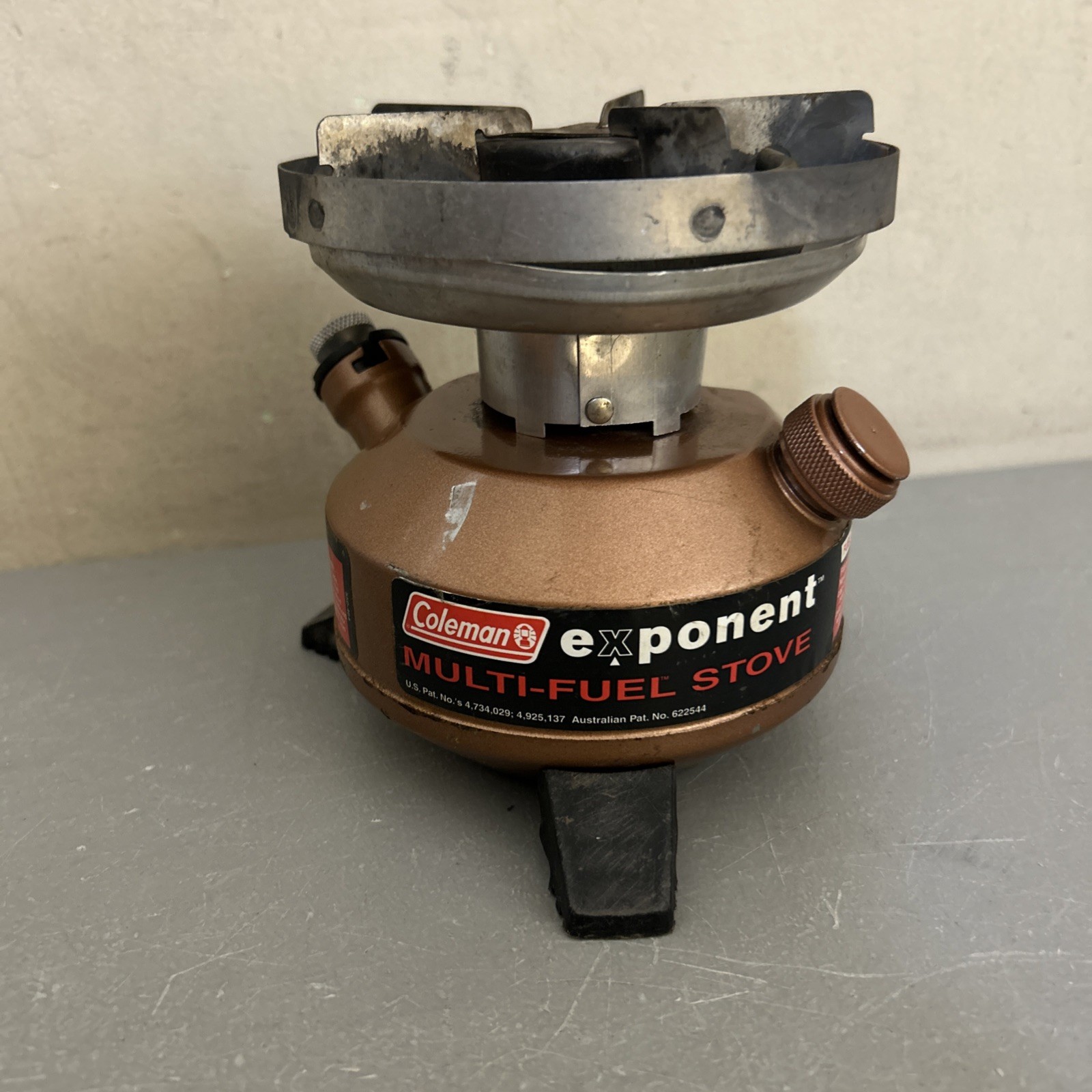 Coleman “Exponent” Multi Fuel Stove Model 550B (dented/ Peeled Paint)