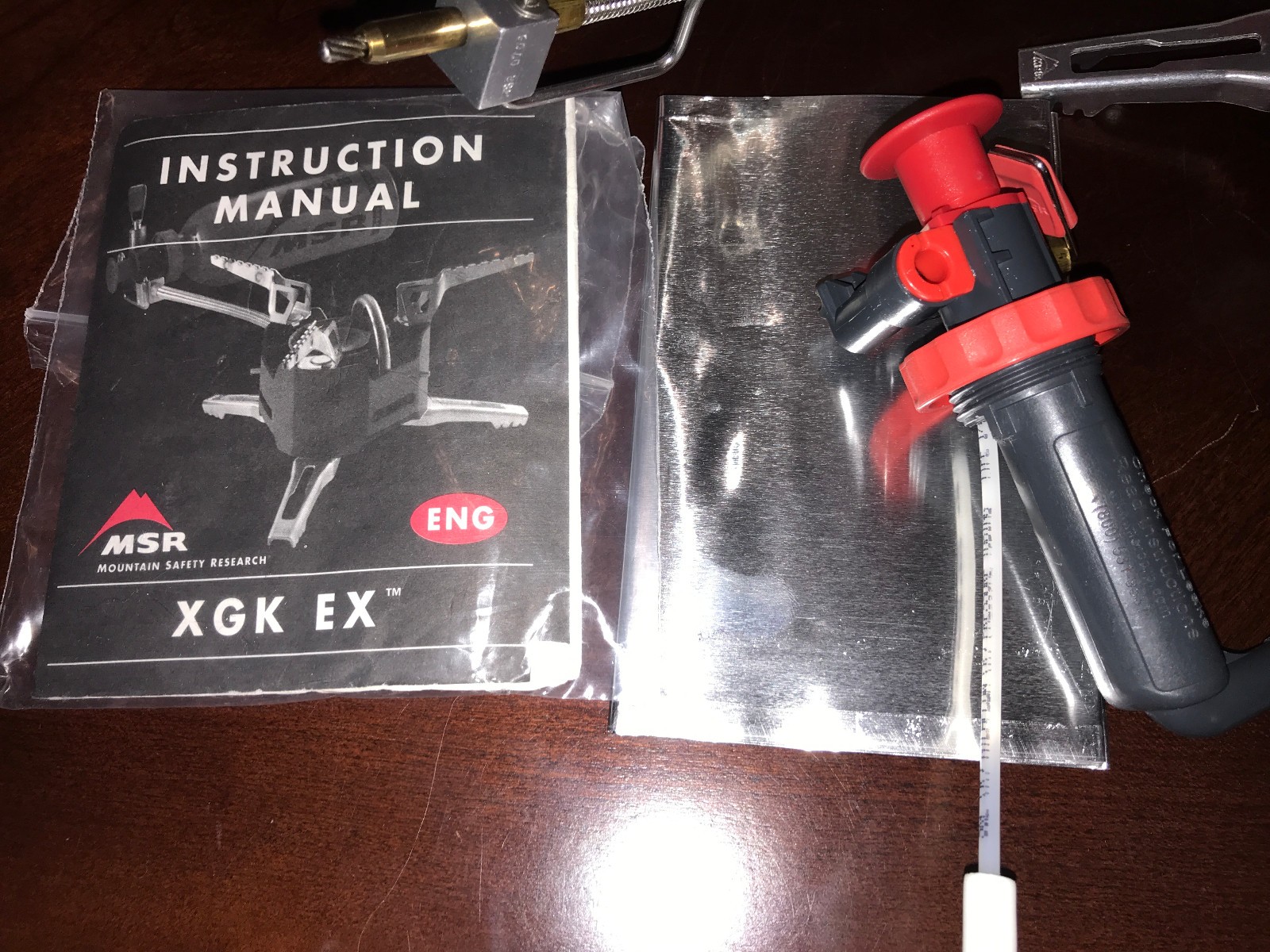 Preowned MSR XGK EX Stove w/ NEW 30 oz Fuel Bottle, MSR Alpine Pot Set, Etc.