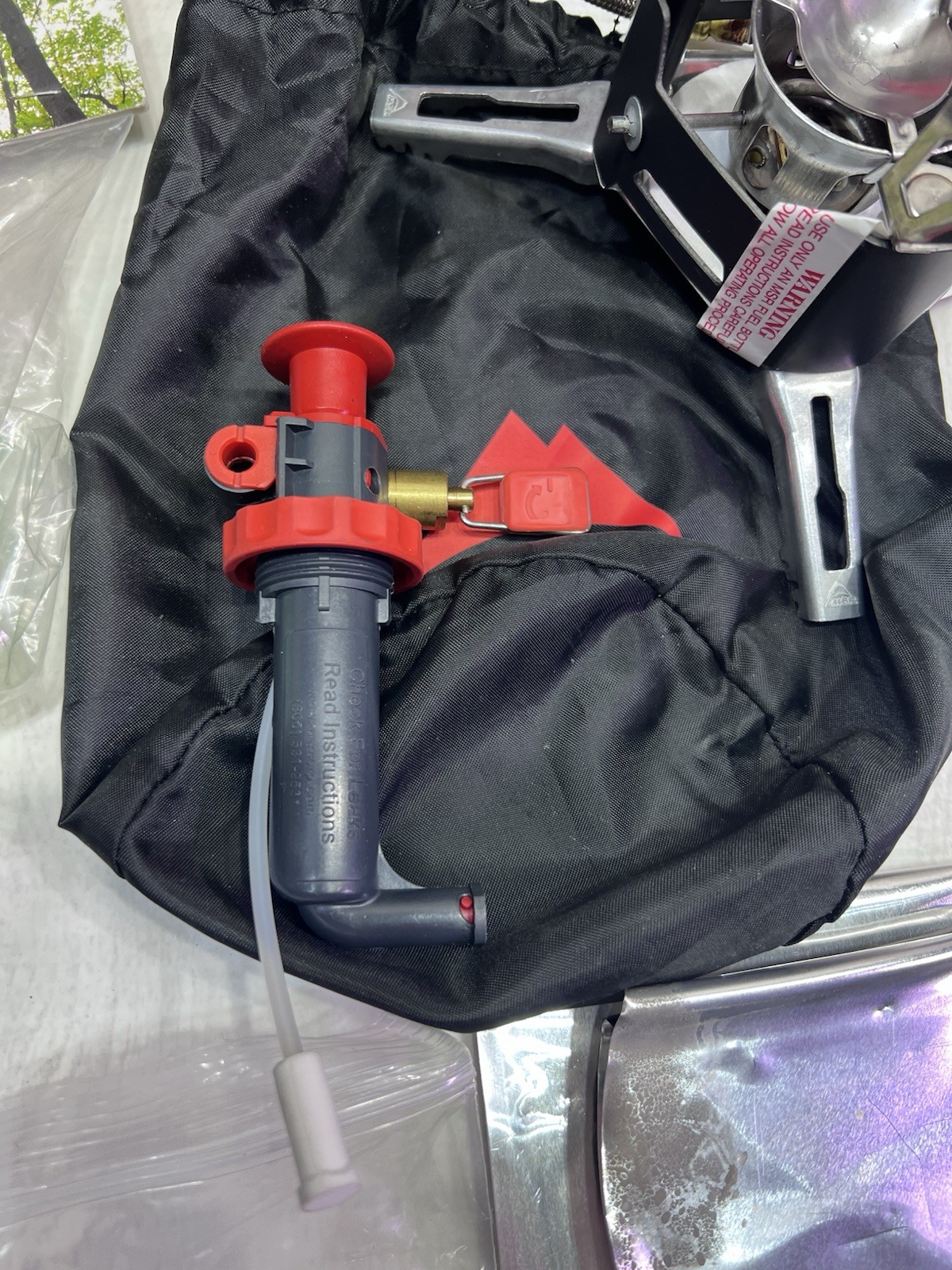 XGK EX MSR MULTI FUEL STOVE TWO STANDARD FUEL PUMPS TWO 30 OZ FUEL BOTTLES CAMP