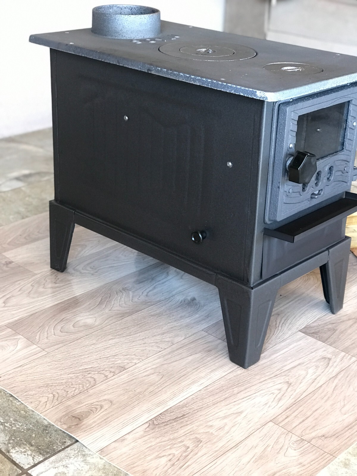 wood and coal burning cast iron stove, camping, caravan and tent stove