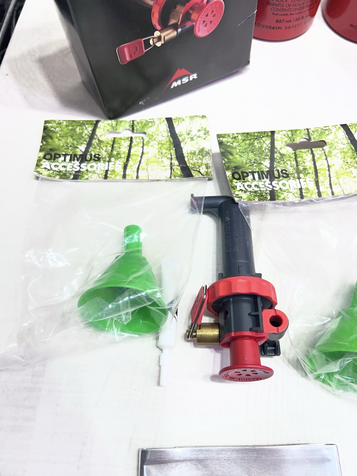 XGK EX MSR MULTI FUEL STOVE TWO STANDARD FUEL PUMPS TWO 30 OZ FUEL BOTTLES CAMP