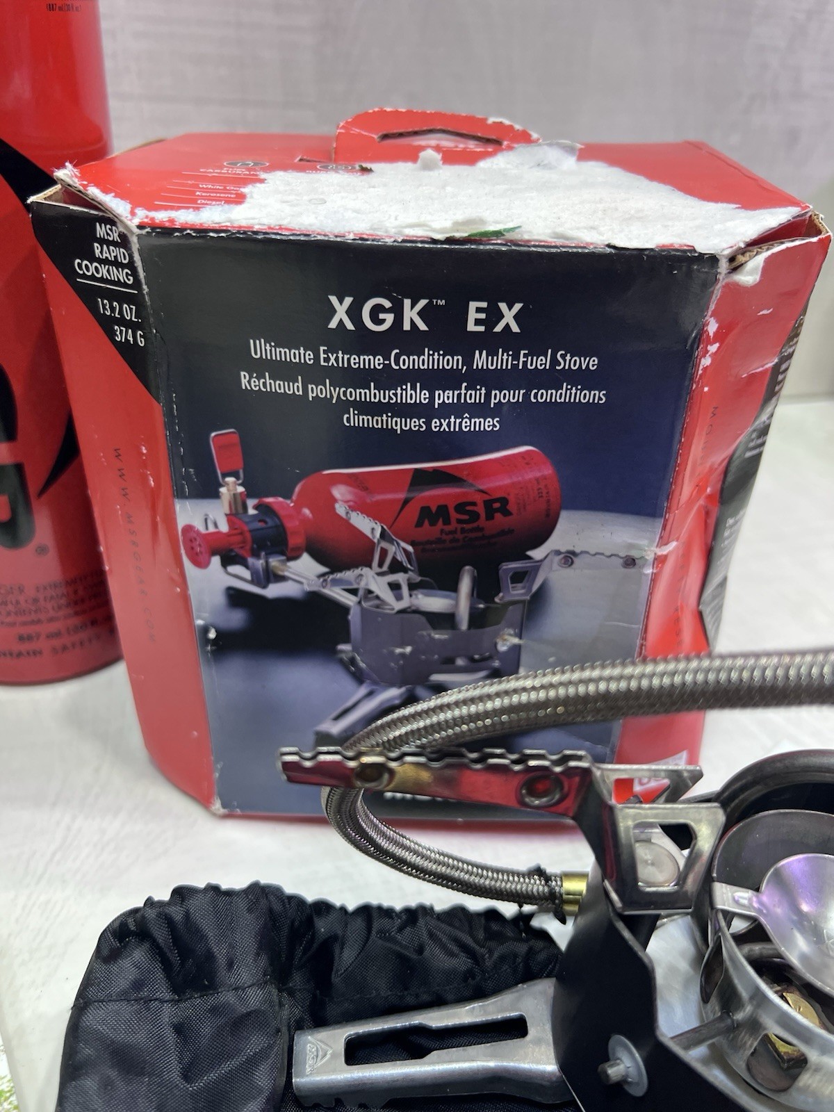 XGK EX MSR MULTI FUEL STOVE TWO STANDARD FUEL PUMPS TWO 30 OZ FUEL BOTTLES CAMP