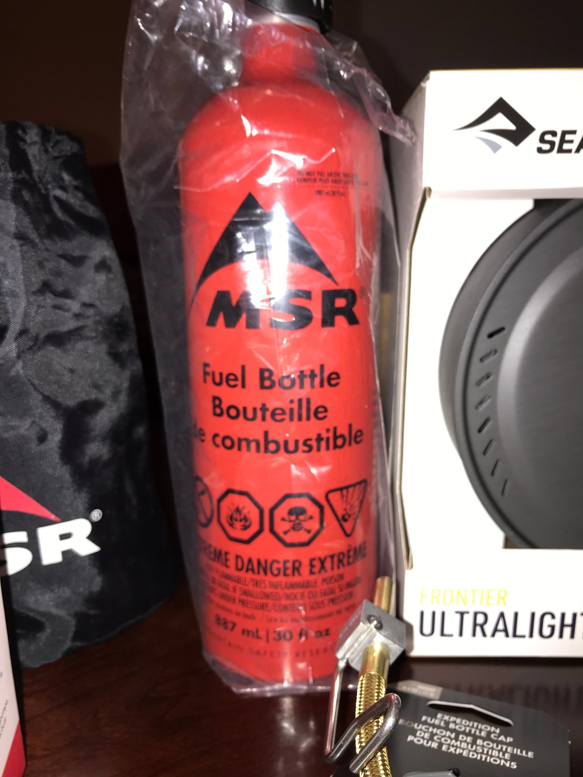 Preowned MSR Dragonfly Stove w/ NEW Fuel Bottle, Sea to Summit Pots, etc